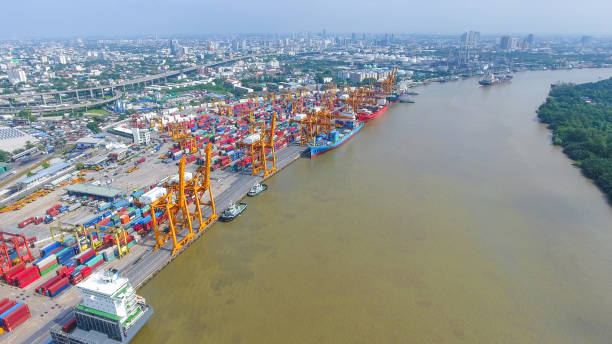 istock Logistics and transportation of Container Cargo ship and Cargo working crane bridge in shipyard 859536862