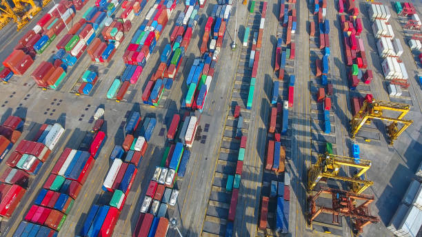 istock Logistics and transportation of Container Cargo ship and Cargo working crane bridge in shipyard 859536870