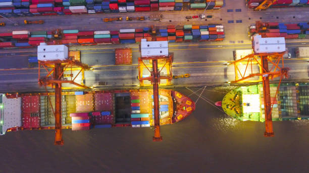 istock Logistics and transportation of Container Cargo ship and Cargo working crane bridge in shipyard 859536926