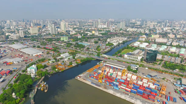 istock Logistics and transportation of Container Cargo ship and Cargo working crane bridge in shipyard 859537088