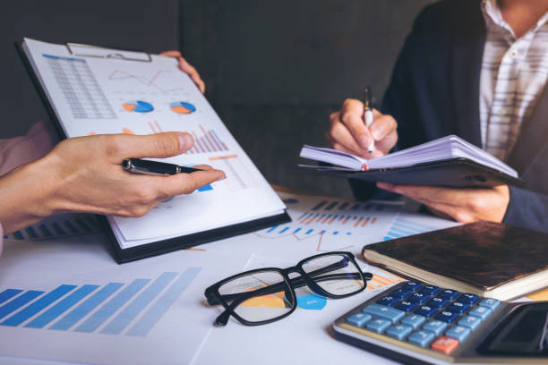 istock Business team meeting working with new startup project, discussion and analysis data the charts and graphs. Digital tablet calculator, laptop computer using, Business finances and accounting concept 859540830