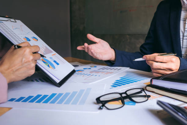 istock Business team meeting working with new startup project, discussion and analysis data the charts and graphs. Digital tablet calculator, laptop computer using, Business finances and accounting concept 859540860