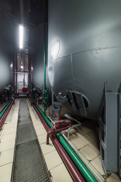 istock Steel semicircular gray tanks for fermenting the yeast mixture 859554802