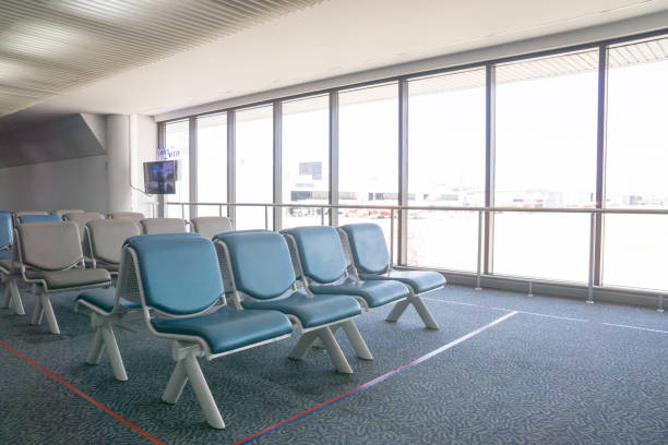 istock waiting chair passenger in airport 859555028