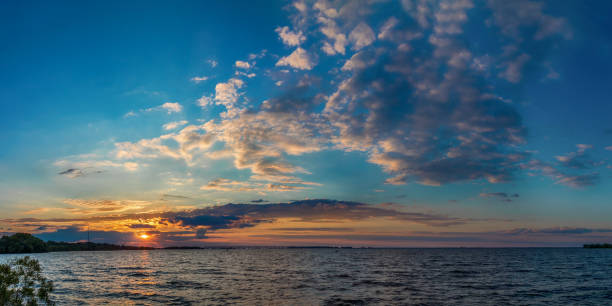 istock Amazing sunset on the river in the summertime 859556246