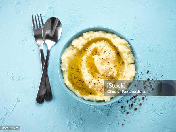 Mashed Potatoes On Blue Concrete Background Stock Photo - Download Image Now - Mashed Potatoes, Heap, Flat - Physical Description