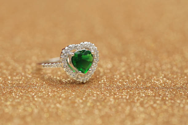istock Heart green gemstone on diamond ring 859558838