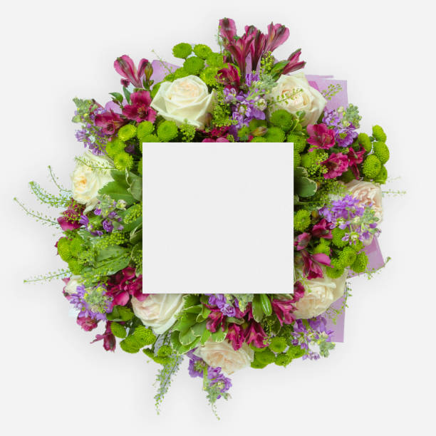 istock Creative layout made of flowers and leaves with paper card note. Flat lay 859561924