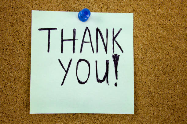 istock Thank you - colorful sticky notes with handwriting on cork bulletin board 859567302