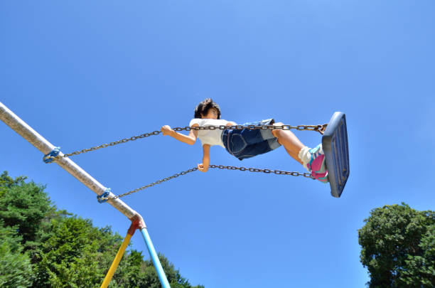 istock Girls playing in the park 859567932