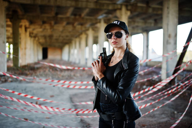 istock FBI female agent at abandoned place. 859570848