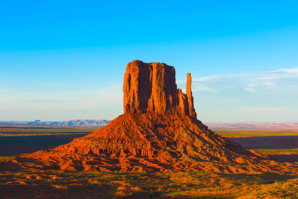 Monument Valley Beautiful sunset over the West Mitten Butte in Monument Valley. Utah, USA west mitten stock pictures, royalty-free photos & images