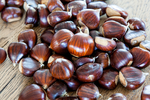 nice chestnuts on a wood table