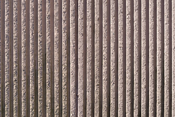 istock Brown tinted corrugated concrete wall 859584116