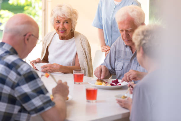 istock Pensioners eating lunch 859584276