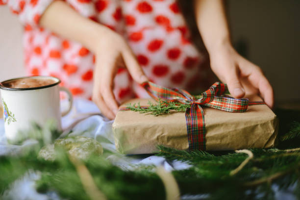 istock Classy Christmas gifts box presents on brown paper 859587068