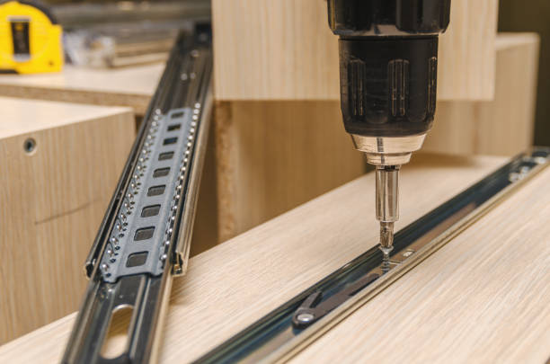 istock Assembling of furniture closeup 859587644