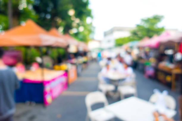 istock Blurred background market fair in sunny day. 859587766