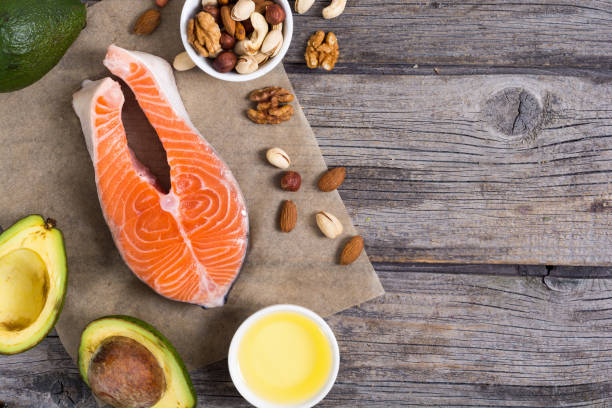istock Healthy food vegetables , nuts and salmon 859590840