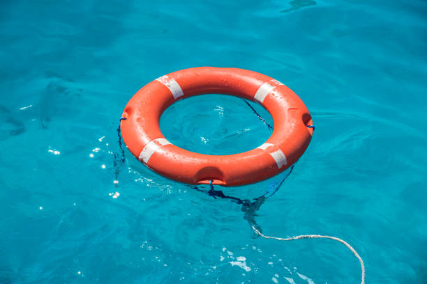 istock life buoy in the blue sea. 859591460