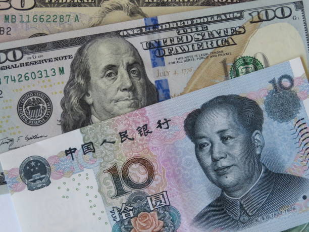 istock Chinese yuan and U. S. dollar 859592696