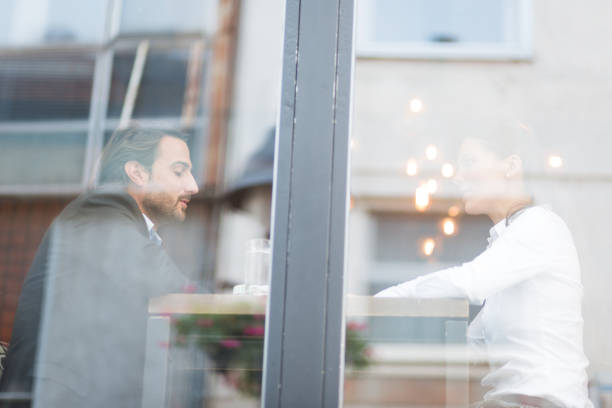 istock Business on the Go. Two colleagues enjoy coffee break 859597230