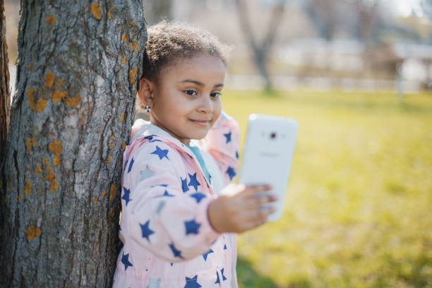 istock girl in park 859600608