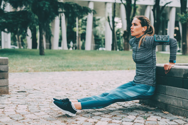 istock Woman doing dips outdoors 859601180