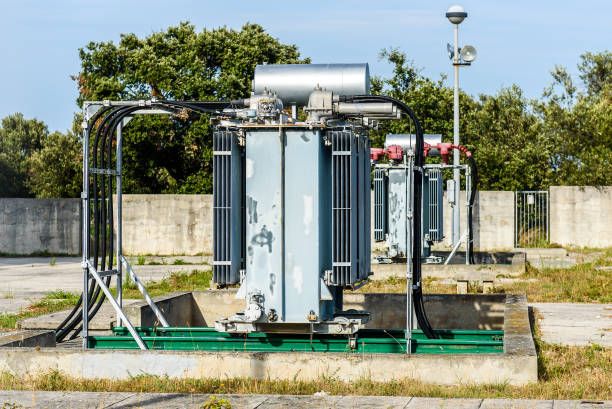 istock Old high voltage electric transformer power station. 859604984