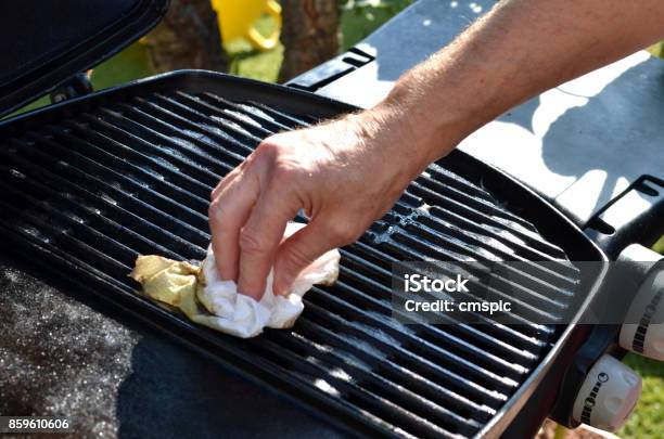 Cleaning The Outdoor Grill Stock Photo - Download Image Now - Barbecue Grill, Cleaning, Clean