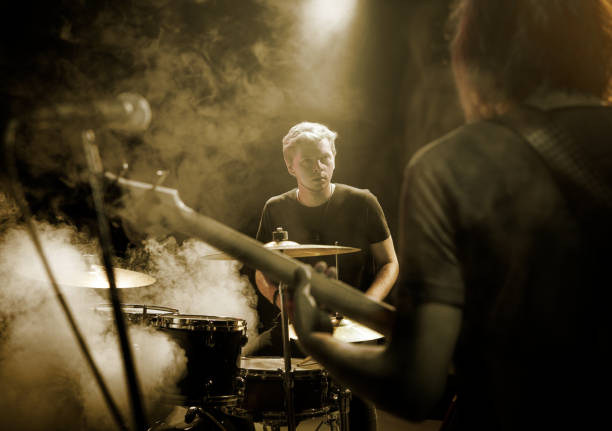 istock The bass guitar player plays solo. 859611922