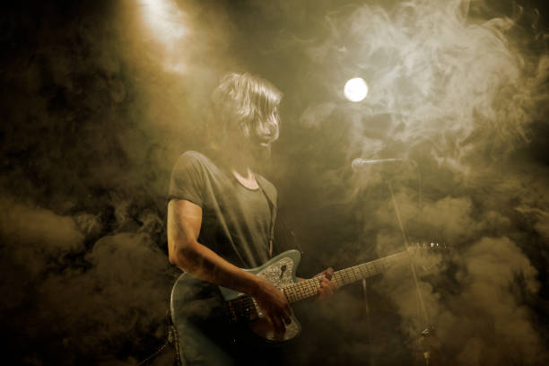 istock Guitarist plays solo. 859611948