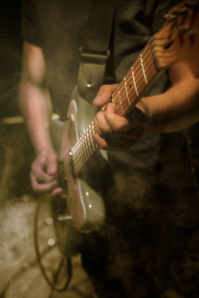 istock Guitarist plays solo. 859611978