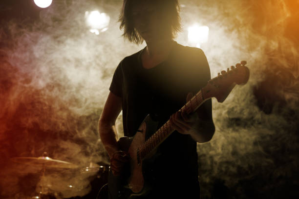 istock Guitarist plays solo. 859612086