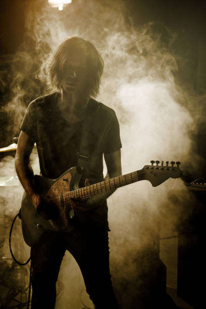 istock Guitarist plays solo. 859612098