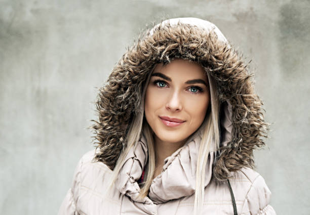 istock Young woman wearing hood 859612286