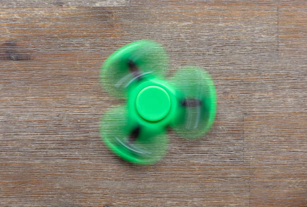 istock Image of Fidget finger spinner stress toy 859615838