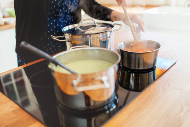 istock Woman making organic  lunch in modern kitchen 859616454