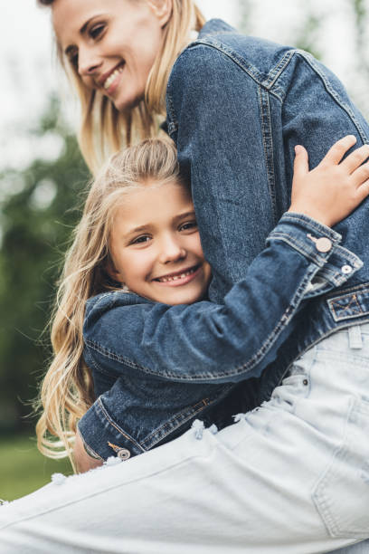 istock mother and daughter embracing 859616686