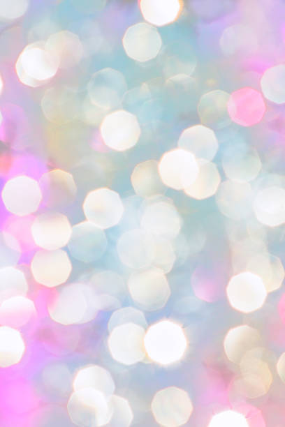istock Purple, blue and white glowing festive Christmas bokeh 859619446
