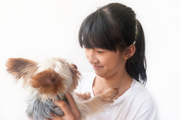 istock Girls and Yorkshire Terrier 859619770