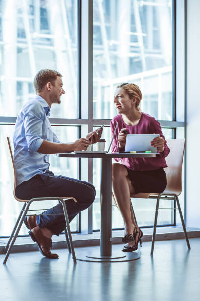 istock Business Couple on Coffee Break 859620258