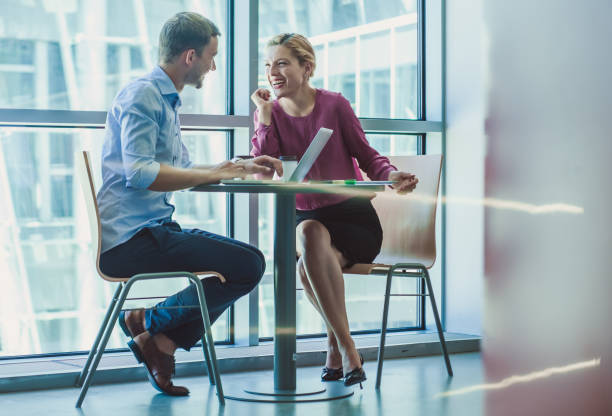 istock Business Couple on Coffee Break 859620274