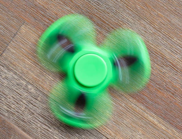 istock Image of Fidget finger spinner stress toy 859623464