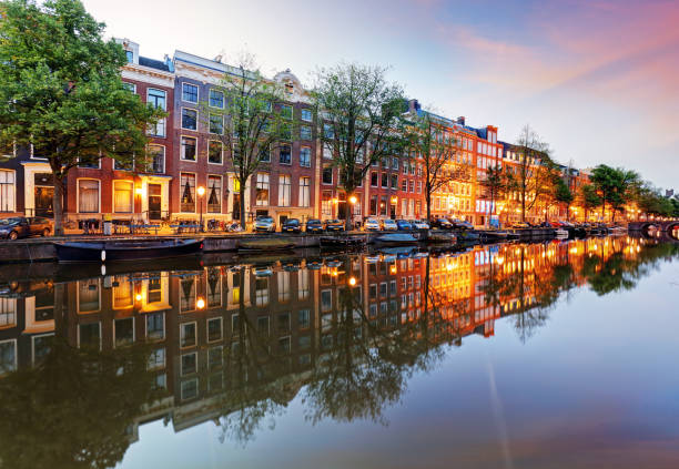 istock Amsterdam Canals West side at dusk Natherlands 859624308