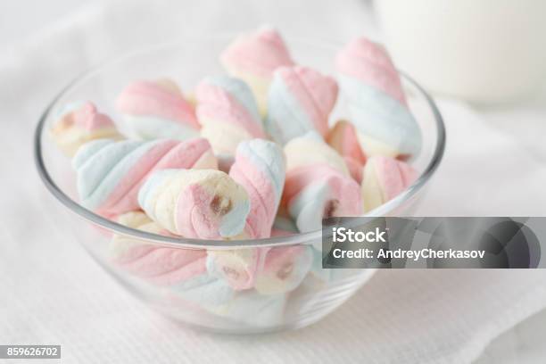 Twisted Marshmallows In A Cup Over Wood Background Stock Photo - Download Image Now