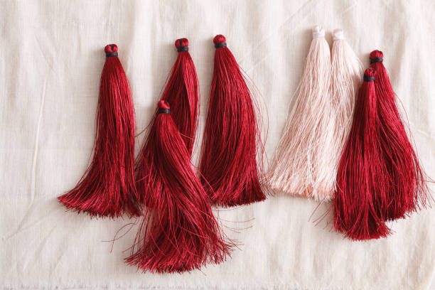 istock Red and white tassels line close up 859627768