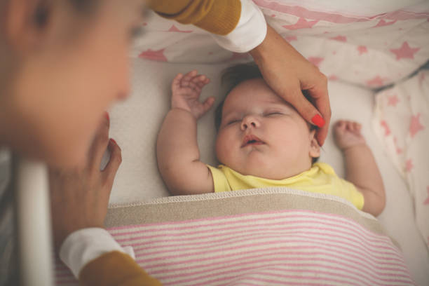 istock Young mother is sleeping  her baby. 859630314