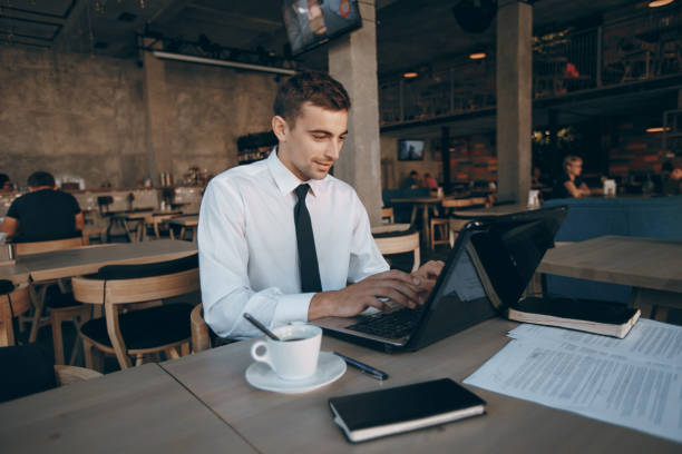 istock businessman in cafe 859631144
