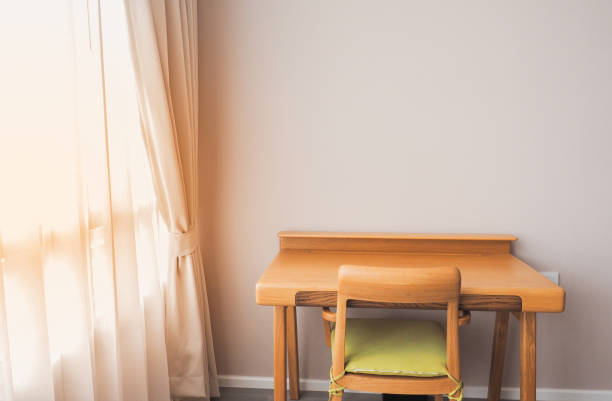 istock Comfortable corner of the work desk near the window 859632830